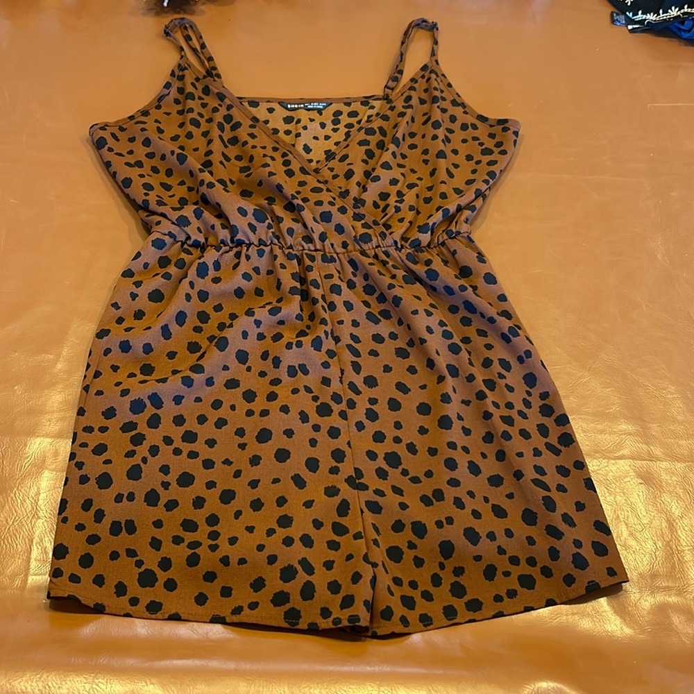 Polka dot lightweight romper, extremely well fitting as the scrunch is high up.